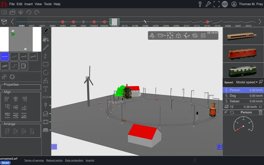A decorated layout: buildings, trees, lamps, poles and a signal.